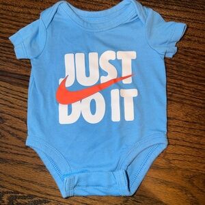 Nike Blue Onesie with Orange Swoosh